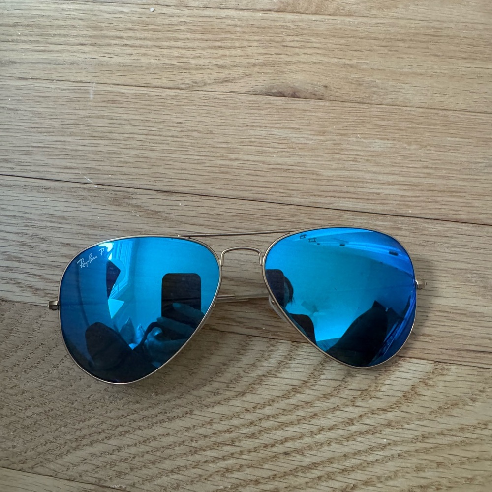 Ray-Ban Gold Frame Sunglasses with Vibrant Blue Lenses